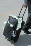 a rolling suitcase with money